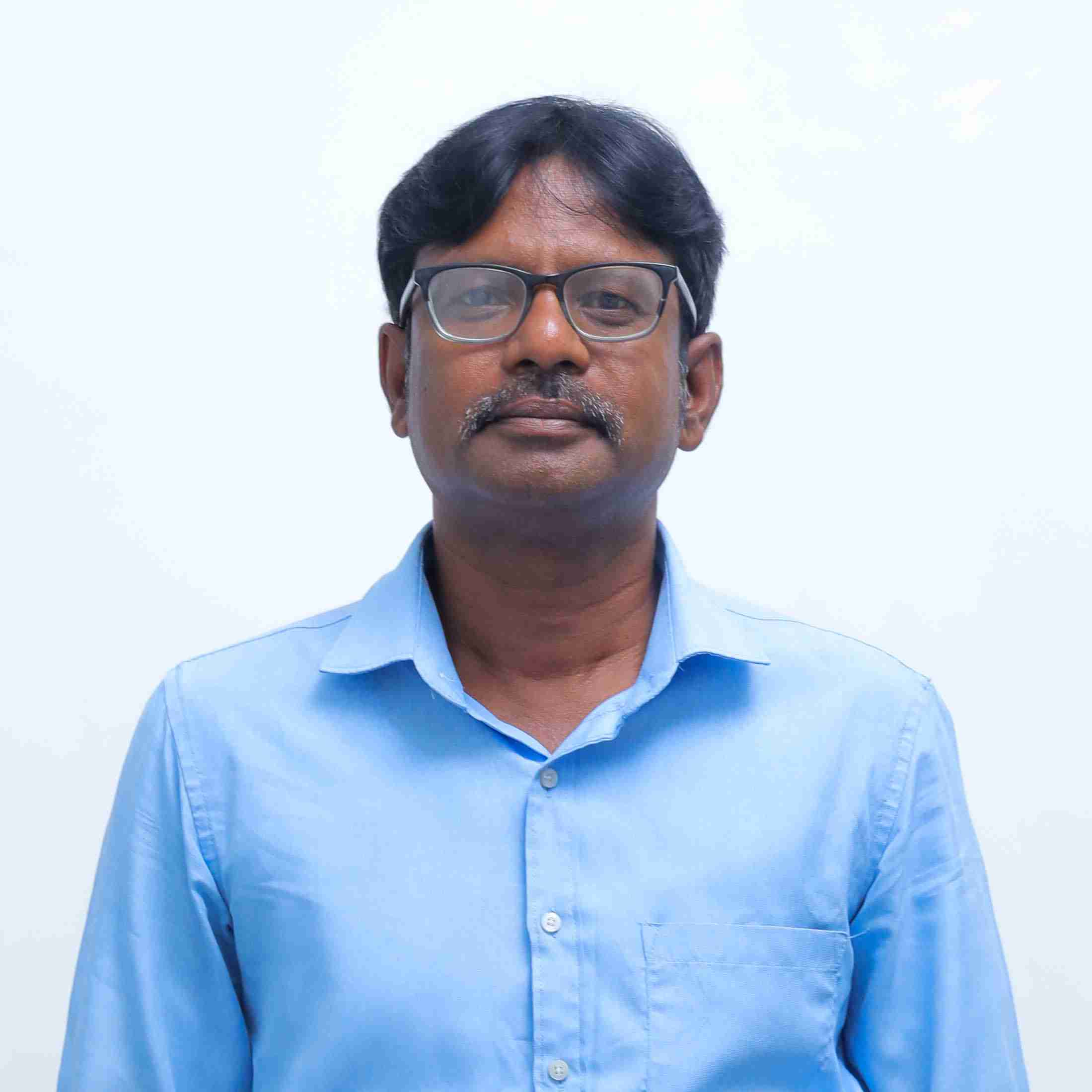 Dr. S. Karunakaran 